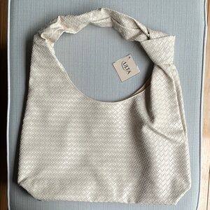 Ulta beauty Cream woven Shoulder Bag